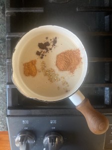 butter, syrup, and spices in pot