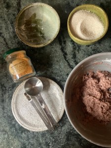 Cornish cakes dough in bowl with ingredients on the side