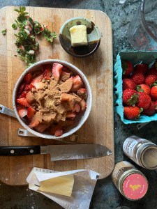strawberries in bowl topped with cinnamon and ginger