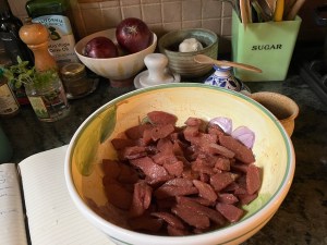 poached quinces seasoned with spices in bowl