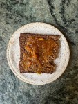 toast with peach preserves on plate