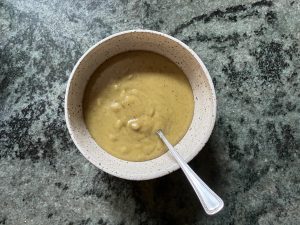 pistachio cream in bowl with spoon